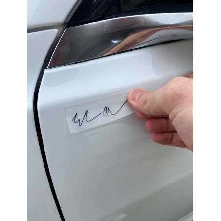 White or black Elon signature sticker