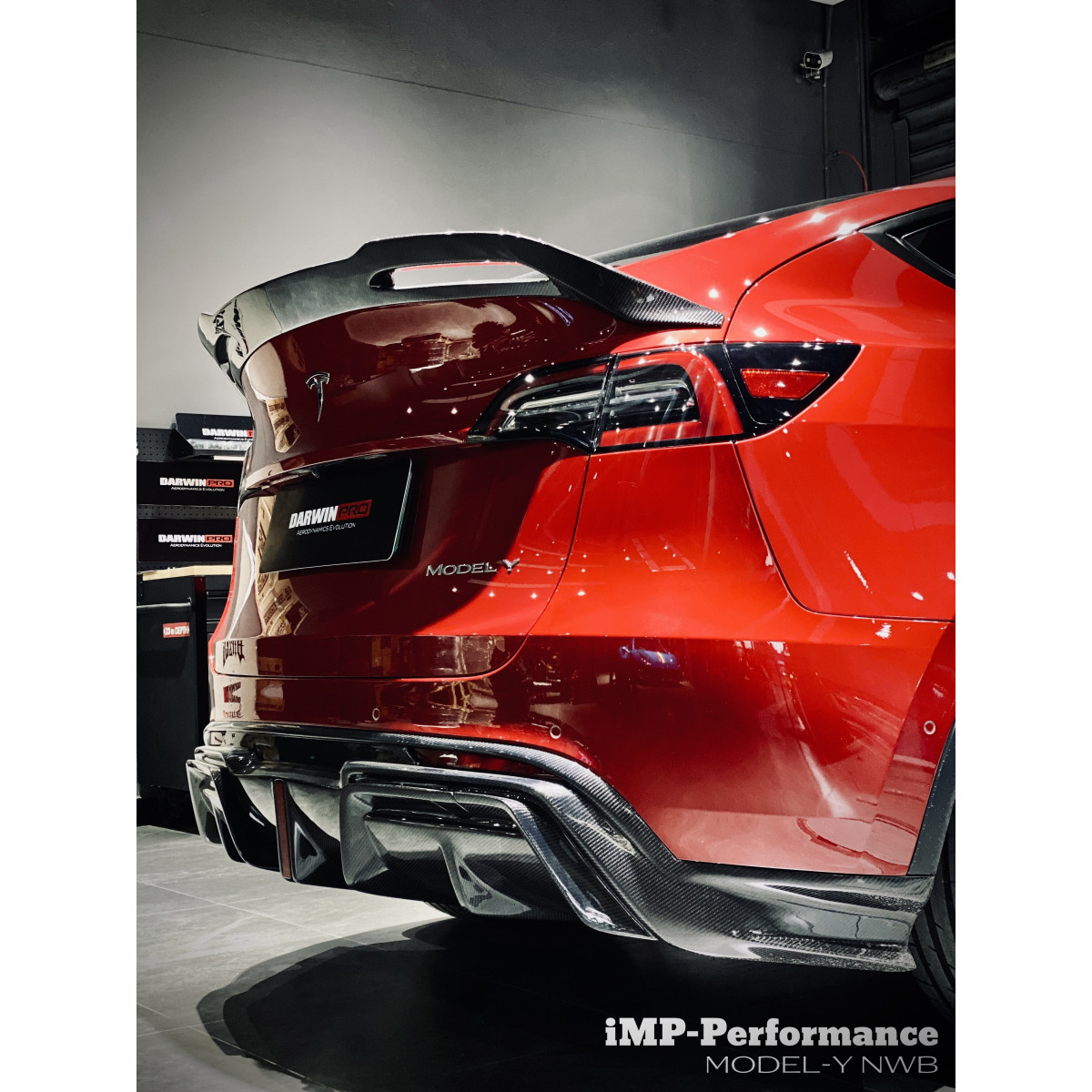 Bakdiffusor i karbon fra DarwinProAERO iMP-Performance-sett til Tesla Model Y