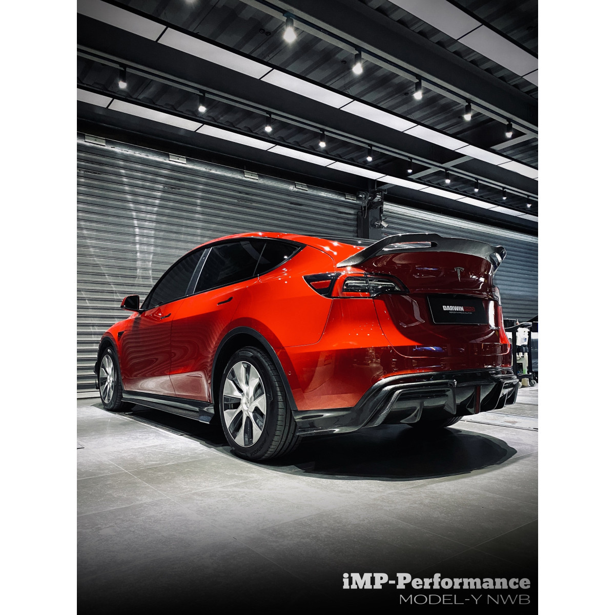 Bakdiffusor i karbon fra DarwinProAERO iMP-Performance-sett til Tesla Model Y