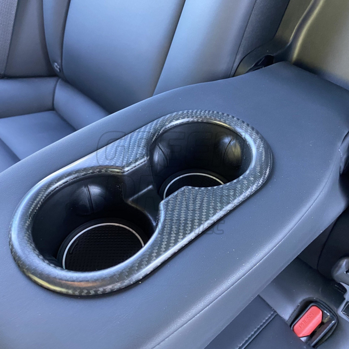 Kopholderindsats i carbon til Tesla Model 3 og Y