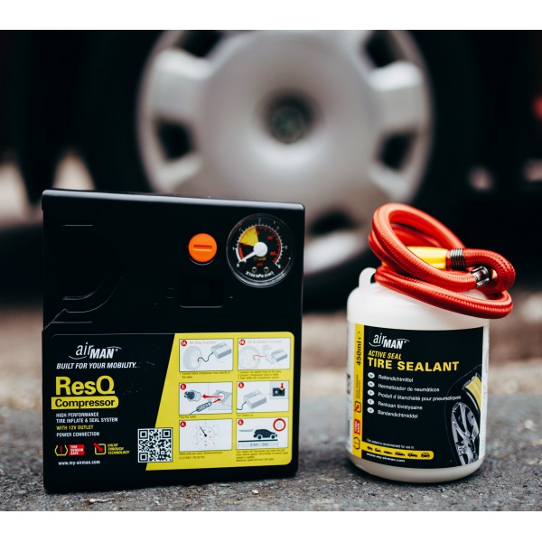 Tire repair kit with compressor